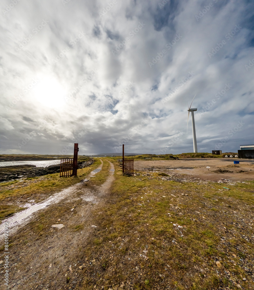 A Wind turbine is generating in Burtonport harbour, Countz Donegal, Ireland A Wind turbine is generating in Burtonport harbour, Countz Donegal, Ireland