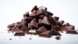 Isolated dark chocolate pieces against a white backdrop