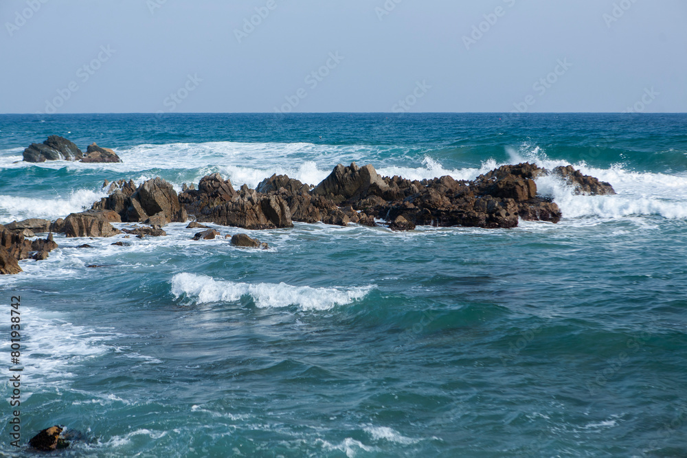 View of the surf on the rocky seaside View of the surf on the rocky seaside