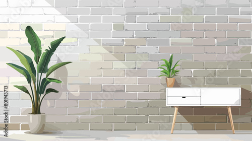 White table with drawer and houseplant near grey bric photo