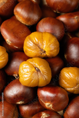 close up of peeled roasted chestnut background.