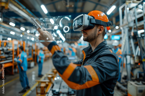 Engineer in safety gear using advanced virtual reality interface in industrial setting.