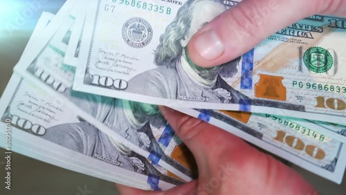Man counting out dollar bills for an investment. Currency. Financial job concept. Concept of a deal.