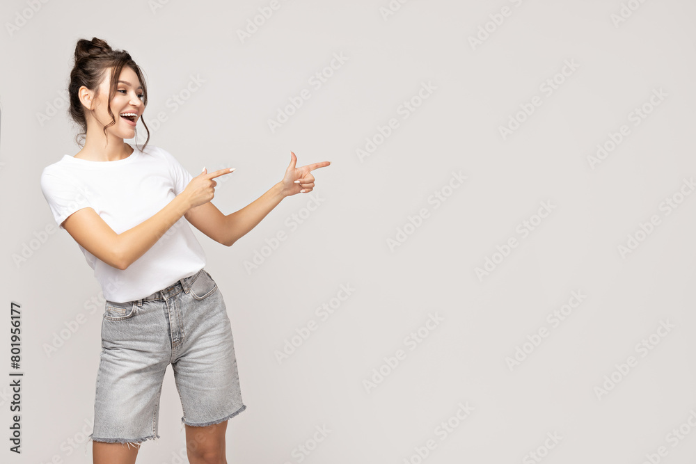 Attractive young girl posing on a white background Attractive young girl posing on a white background
