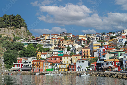 Old colorful buildings and castle in Parga cityscape