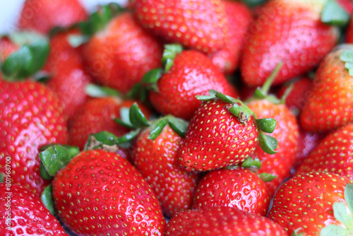 Red ripe strawberries background. Strawberry texture close up photo. Fresh organic berries macro. Eating fresh concept. 