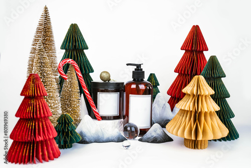 dark jar with lid and dispenser on the background of Christmas decorations, side view