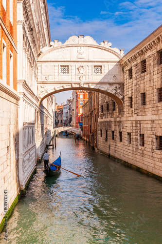 Iconic Bridge of Sighs and a gondolier in Venice in Veneto, Italy