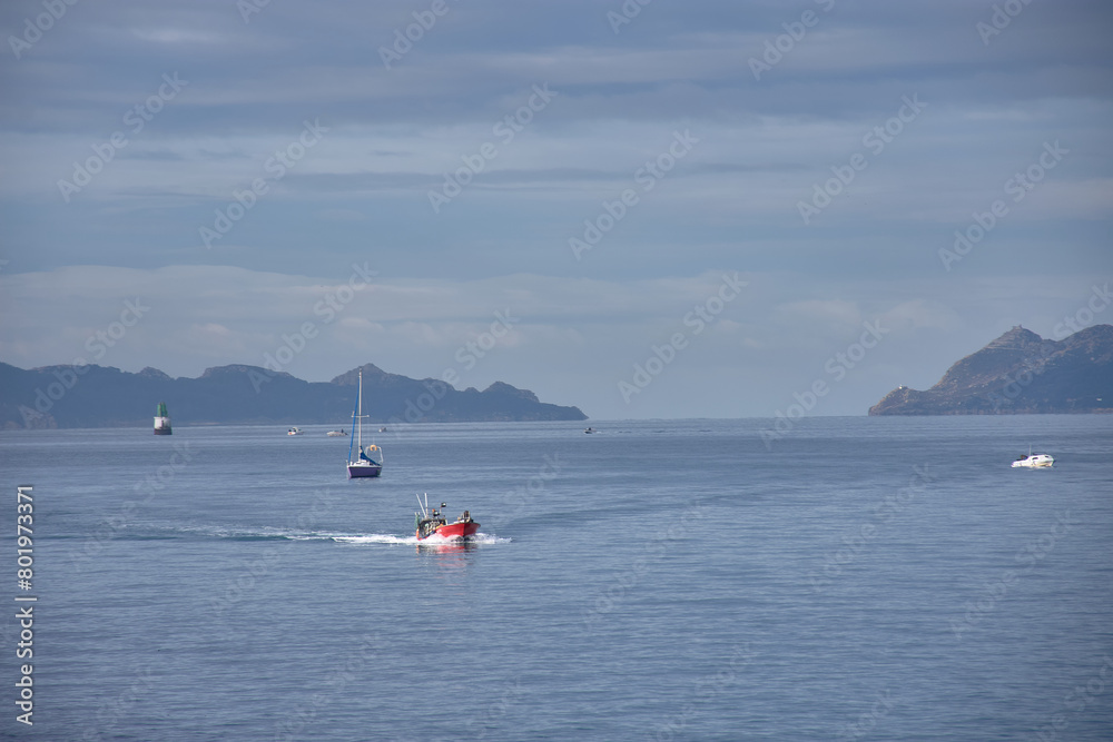 The Ria de Vigo with the Cies Islands in the background and small boats sailing