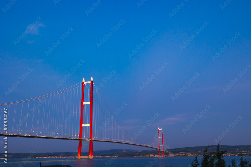 Fototapeta premium 1915 Canakkale Bridge at sunset. Development or economy of Turkey concept photo