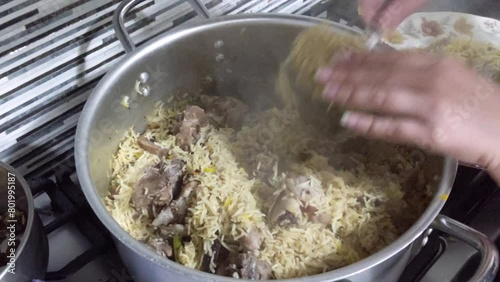A footage of mutton and mutton biryani cooked in hot rice