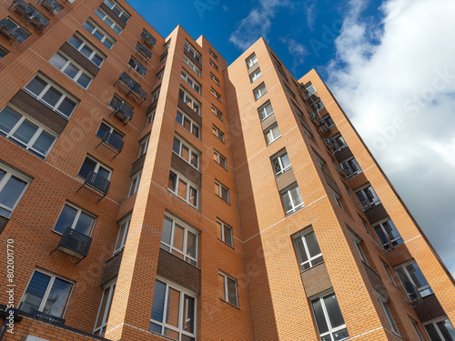 Apartments Building Towers. New building. The facade of the new residential high-rise buildings against the sky . The concept of building a typical residential neighborhood.