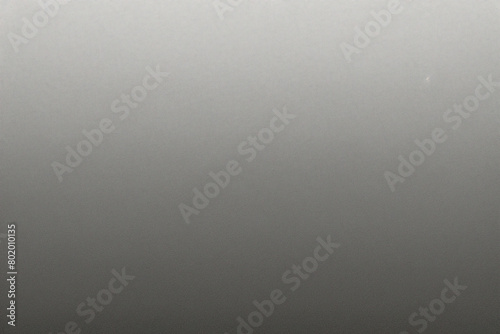 Superficie de plástico lisa de color gris mate con textura fina y viñeta en el lado derecho. Fondo texturizado exquisito, fondo suave en blanco 
