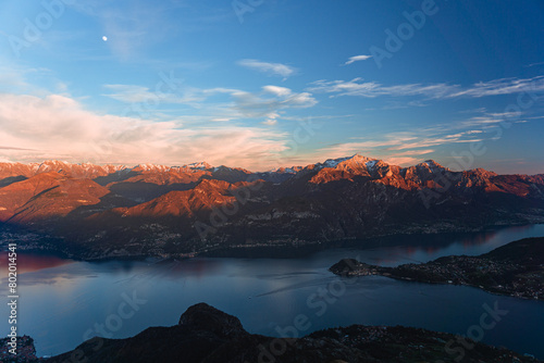The lights and colors of the sunset on Lake Como, near the town of Tremezzo, Italy - December 24, 2023 © Roberto