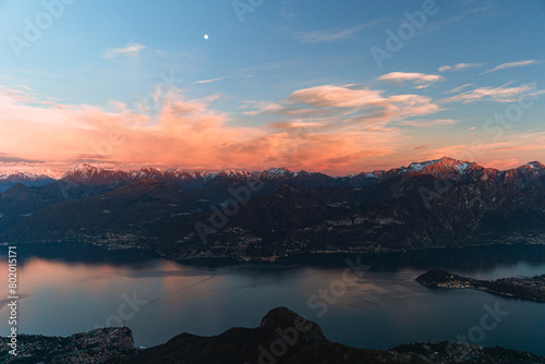 The lights and colors of the sunset on Lake Como  near the town of Tremezzo  Italy - December 24  2023