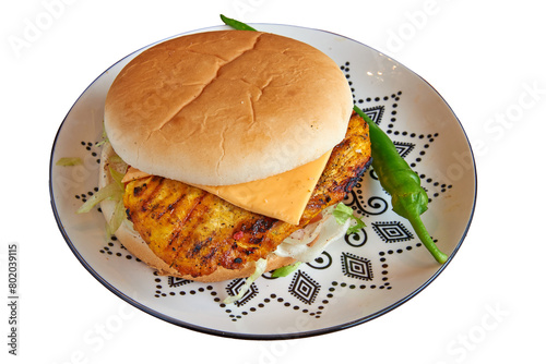 Obraz na płótnie Chicken burger on decorated plate on wooden textured table w salonie