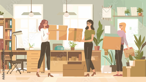 Female colleagues packing things in office on moving
