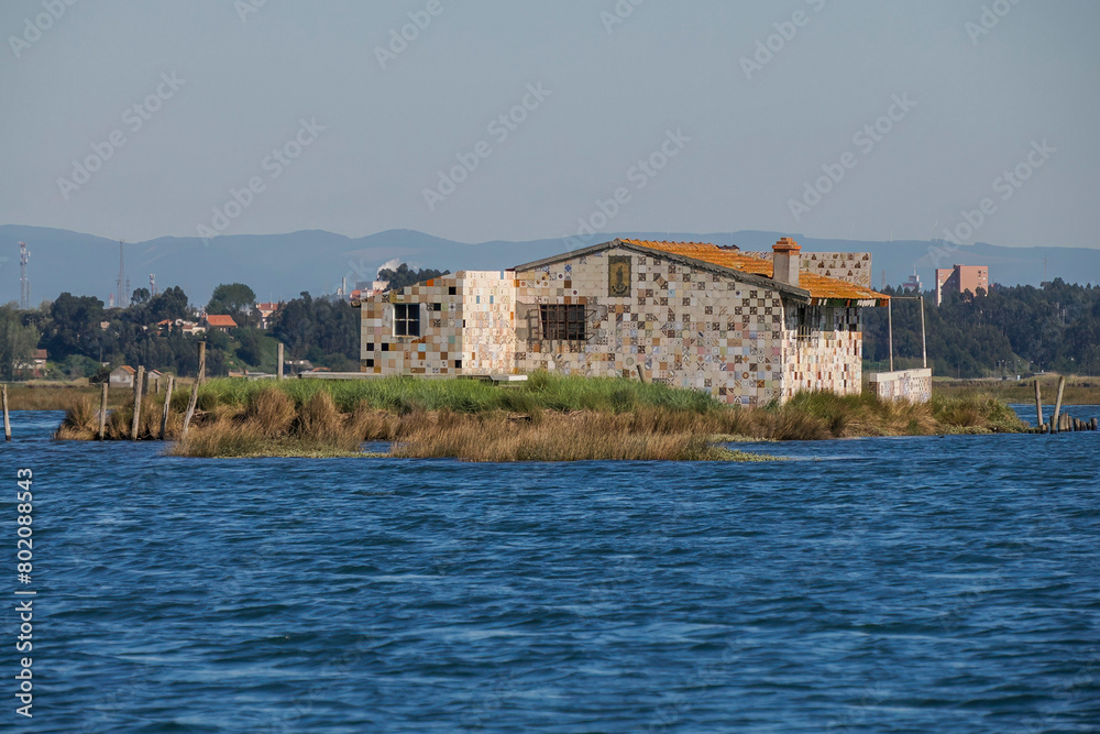 House in Aveiro lagoon Ria de Aveiro located on the Atlantic coast of Portugal