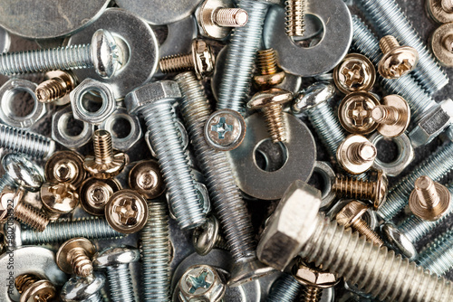 Mixed screws and nails. Industrial background. Home improvement.bolts and nuts.Close-up of various screws. Use for background, top view. © bukhta79