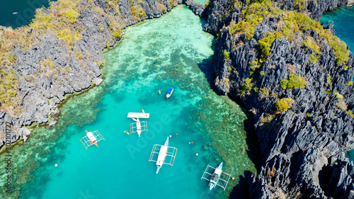 Beautiful Aerial view of One of the best island and beach destination in the world, a stunning view of rocks formation and clear water of El Nido Palawan, Philippines. photo