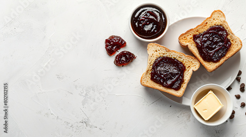 Composition of toasted bread with sweet jam butter