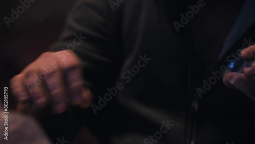 Guy weighing Cocaine on the table