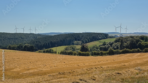 Fields and meadows with windmills in the countryside of Luxembourg, Wallonia, Belgium  photo