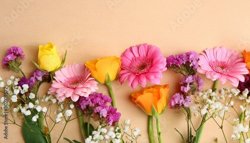 Colourful flowers on beige background