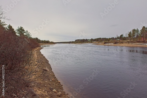 Landscape, view of Vuotson canal in cloudy spring weather, Lapland, Finland.