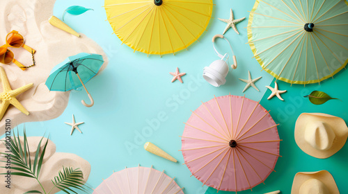 Creative summer composition with mini umbrellas beach
