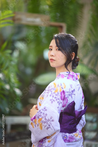 portrait woman with yukata dress in the garden