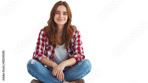 Portrait of a casual happy young woman sitting on the floor on transparent background.
