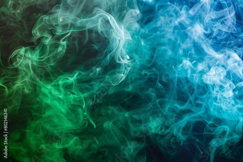 Vivid swirls of blue and green smoke create a dreamy and mystical texture against a black backdrop