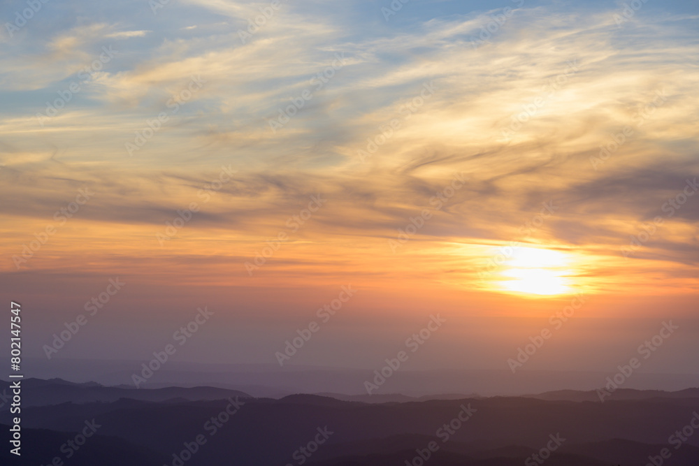 Obraz premium Sunset evening over the mountains