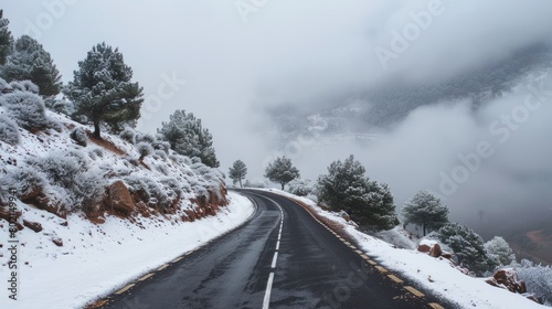 Beautiful landscape road with snowy mountain at winter season. Generated AI image