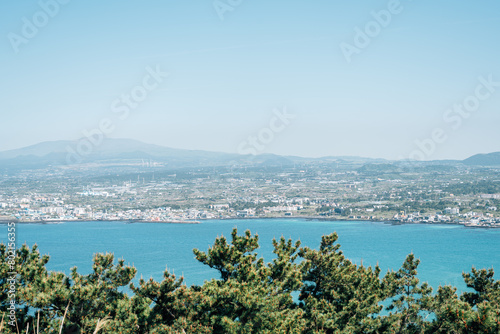 Obraz na płótnie Jeju Oreum and seaside city view from Biyangdo Island Biyangbong peak in Jeju island, Korea w salonie