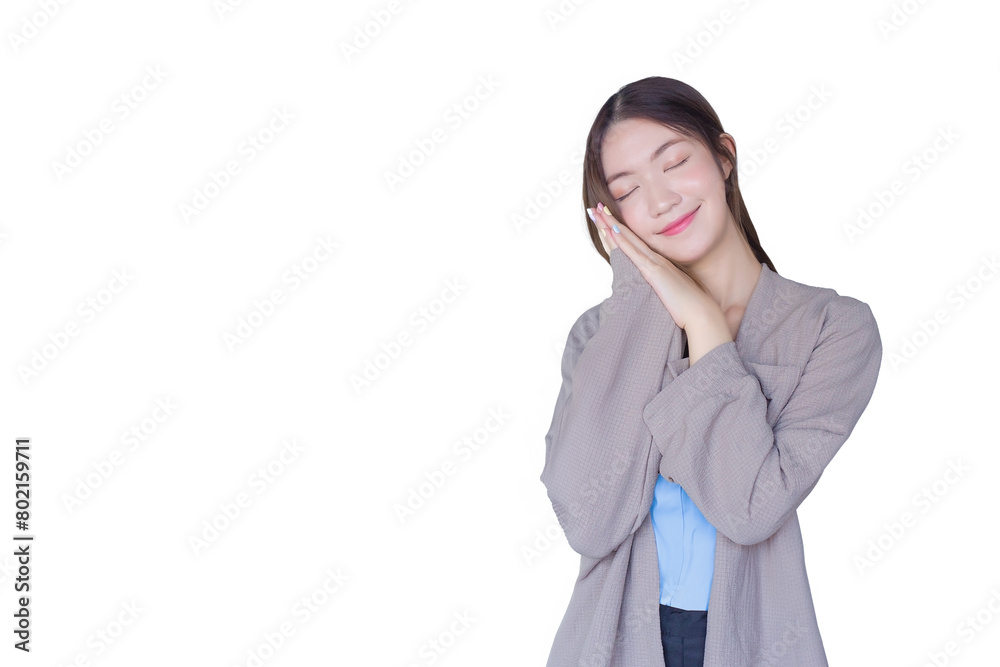 Smiling beautiful young asian woman poses for a good night nap while isolated white background. Smiling beautiful young asian woman poses for a good night nap while isolated white background.