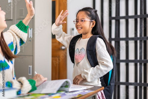 Portrait asian teacher help teaching children student having fun activity learn, study with book making homework, student, education, knowledge, elementary, lessons, kid, child, in classroom at school
