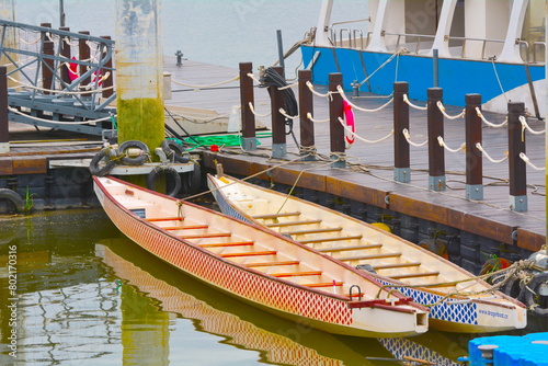 Two ships docked at the pier