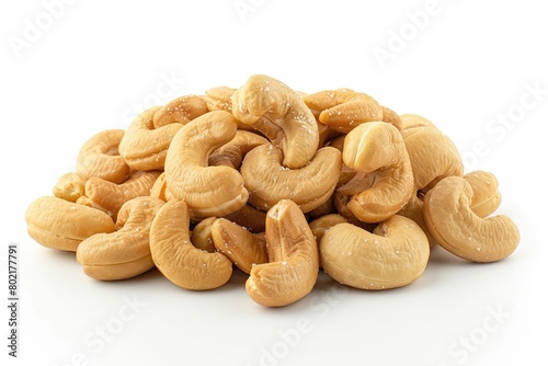 A small pile of salted cashews, arranged neatly, showcasing their golden-brown color and enticing texture photo