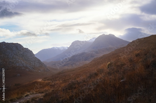 Views of the snow covered summits of Beinn Dearg Bheag and Beinn Dearg Mor near River Gruinard in the Scottish Highlands, Scotland, UK.