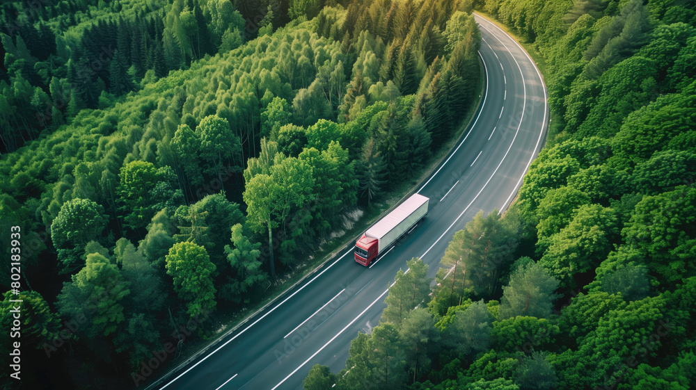 Fototapeta premium A lone truck travels a forest-lined highway, merging technology with nature's tranquility Generative AI