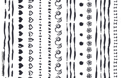 Monochrome black and white seamless brushes patterns set with sketchy doodle shapes, hearts and flowers. Vintage folk abstract borders bundle