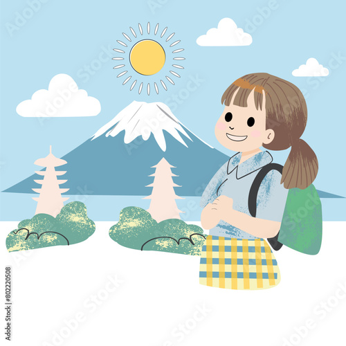 Tourist girl with backpack looking at Fuji Mountain with lake foreground, traveling concept. photo