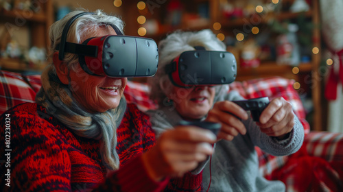 Seniors people have fun playing internet games. Elderly couple, man and woman, sitting at home, play an online game in virtual reality helmets.