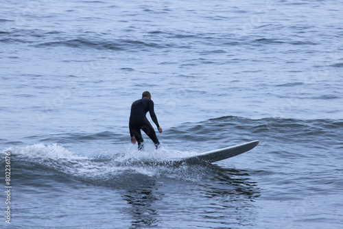 Surfer riding the ocean waves