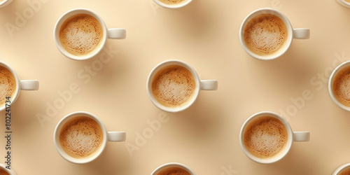 Pattern of many coffee cups arranged on light beige background with copy space