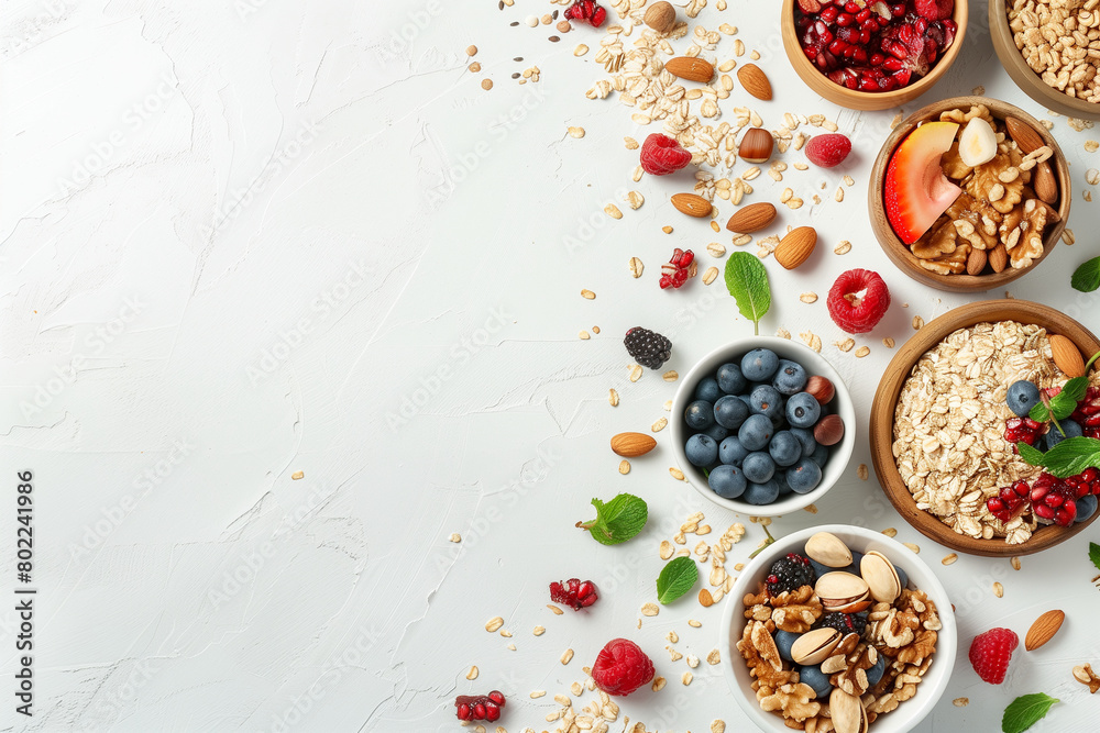 Artistic arrangement of summer fruits, muesli, and nuts with space for text Artistic arrangement of summer fruits, muesli, and nuts with space for text