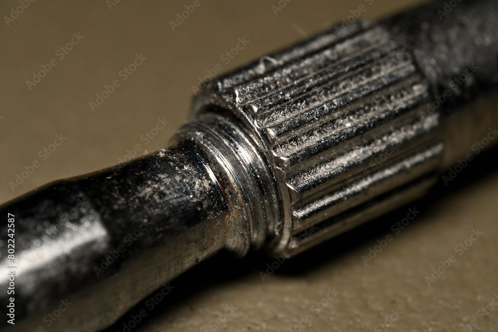 Fototapeta premium Metal screw into nut