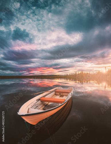 Boat on the lake at sunset (Alttajärvi - Kiruna - Sweden)